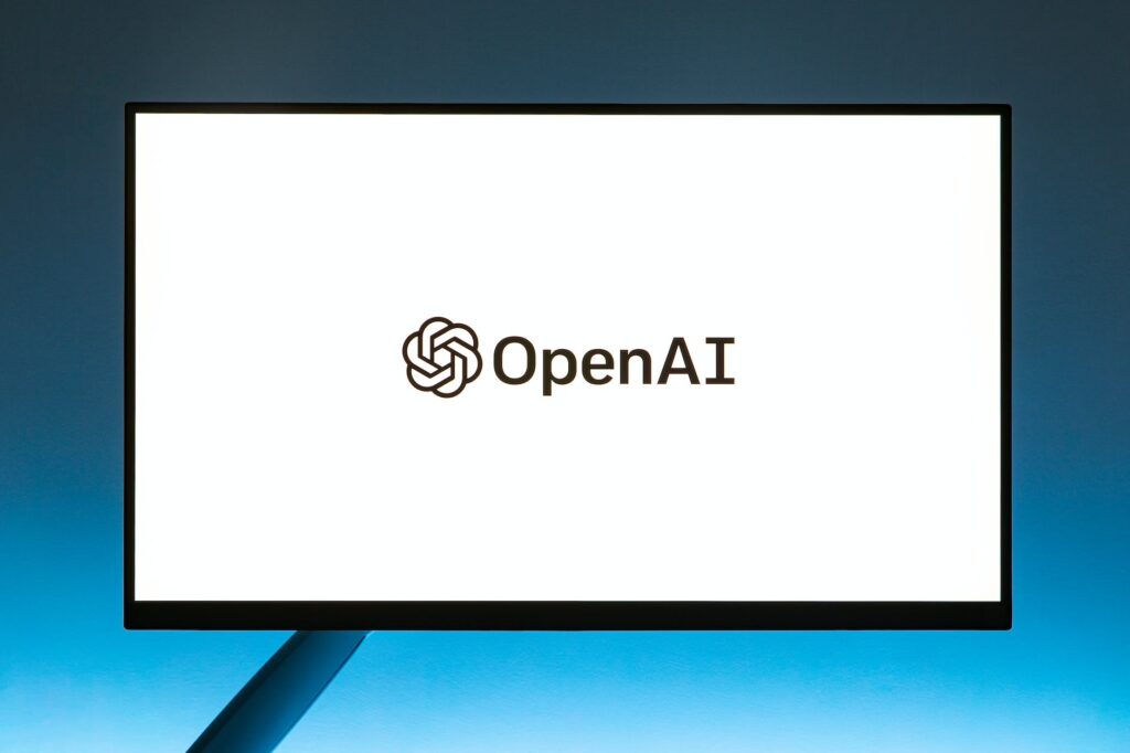 monitor screen with openai logo on white background