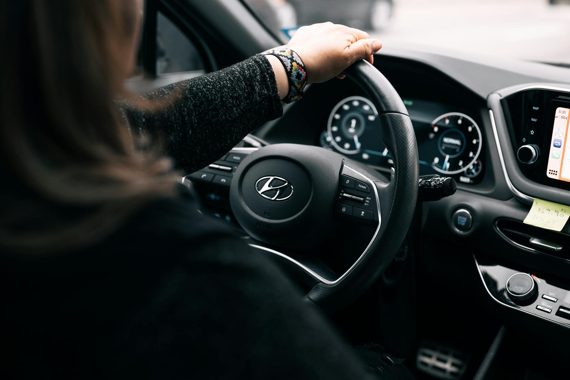 woman sitting inside a car